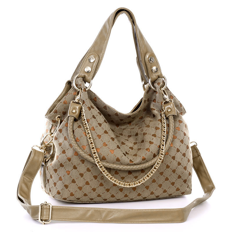 复古淑女单肩帆布心型印...