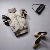 2013<em>时尚</em>街拍 <em>韩版</em>短款 <em>马夹羽绒服</em> 花朵袖女装